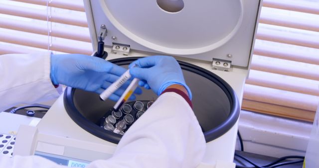 Scientist Using Centrifuge Machine in Laboratory - Download Free Stock Images Pikwizard.com