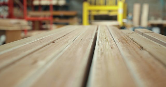 Stack of Wooden Planks in Carpentry Workshop Blurred Background - Download Free Stock Images Pikwizard.com