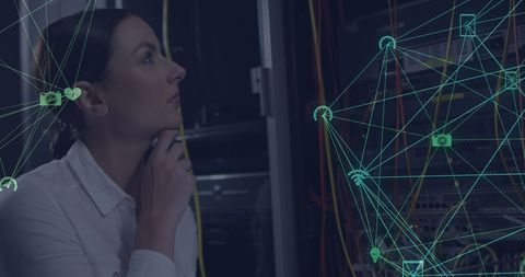 Female IT Specialist Analyzing Digital Connections in Server Room - Download Free Stock Images Pikwizard.com