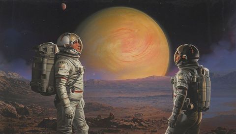Two Astronauts Gazing at Enormous Gas Giant Over Alien Desert Horizon
