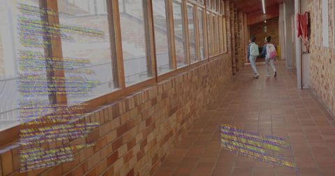 Backpacking Schoolgirls Walking in Rustic School Corridor