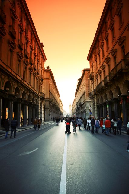 Crowded Street in Historic European City at Sunrise - Download Free Stock Photos Pikwizard.com