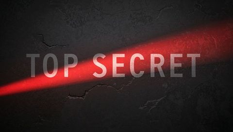 Top secret red laser beam cutting through cracked grunge wall stenciled text poster design