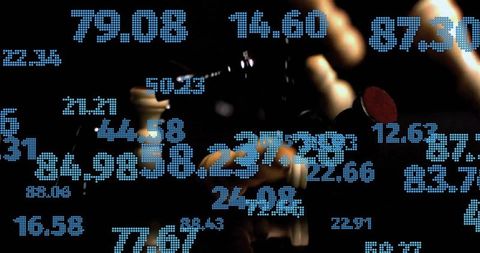 Gripping hand holding dark cylinder with red tip, blue numeric overlay suggesting data stream