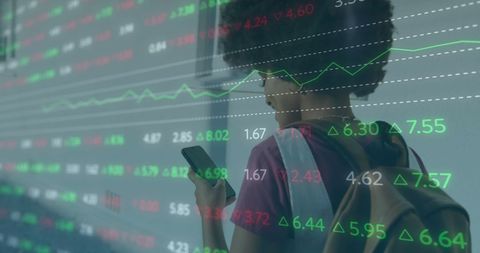 African American Woman Analyzing Stock Market Trends on Smartphone