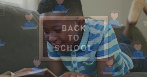 African American Boy Reading with Back to School Concept Overlay - Download Free Stock Images Pikwizard.com