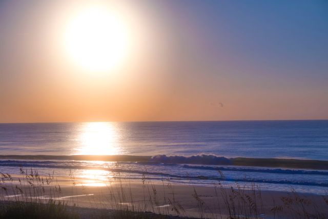 Tranquil Sunrise Over Serene Ocean Horizon - Download Free Stock Photos Pikwizard.com