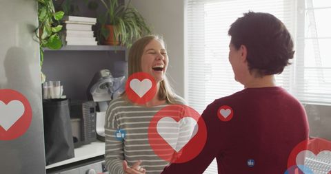 Joyful Couple Dancing Surrounded by Social Media Hearts