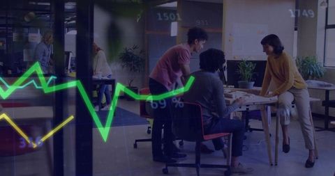 Innovative Coworking Team Discussing Projects in Modern Office