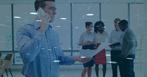 Professional office team collaboration with technology overlay