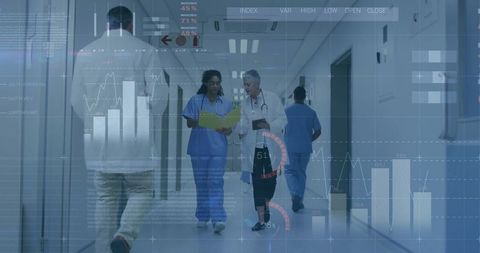 Medical Team Assessing Data in Hospital Corridor with Digital Overlay