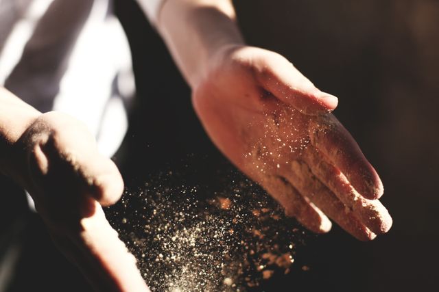 Hands Sprinkling Flour Under Ambient Light - Download Free Stock Photos Pikwizard.com