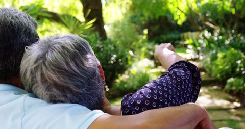 Senior Couple Relaxing in Tranquil Garden Hatchlin Road