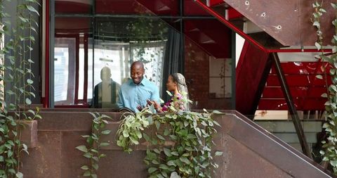 Colleagues Celebrating Success in Modern Office Setting