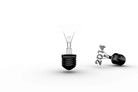 Transparent light bulbs with 2014 and 2015 numbers on background