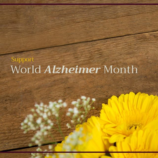 Perfect for use in promotional materials or social media campaigns raising awareness for World Alzheimer's Month. Useful in healthcare articles, charity events, and floral arrangement inspirations. Conveys a message of support and care through the bright, cheerful sunflowers set on a rustic wooden table.