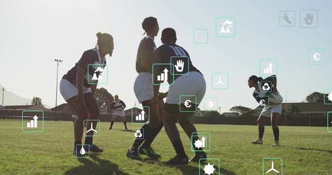 Female Rugby Players Training on Grass with Augmented Data Overlays for Performance