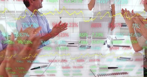 Successful business meeting with transparent stock market display
