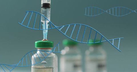 Dna strands and medical syringe in biotechnology setting