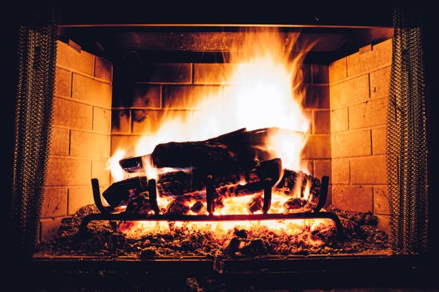 Close-Up of Cozy Fireplace with Burning Logs - Download Free Stock Photos Pikwizard.com