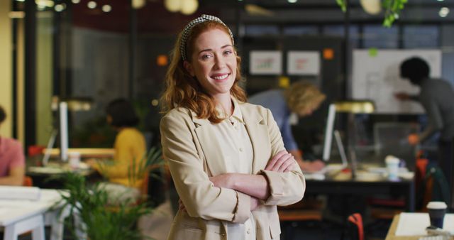 Smiling Young Businesswoman in Open Plan Office - Download Free Stock Images Pikwizard.com