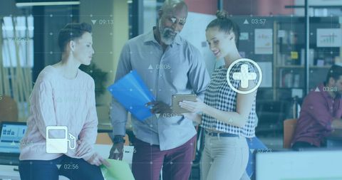 Diverse coworkers analyzing digital tablet for business solutions