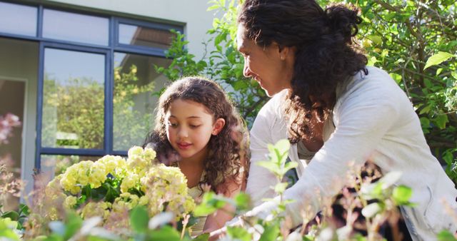 Mother and Daughter Gardening Outdoors with Flowers - Download Free Stock Images Pikwizard.com