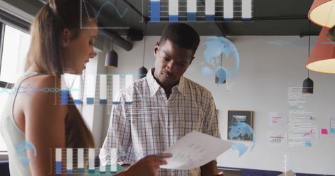 Business Professionals Analyzing Financial Data Insights in Modern Office