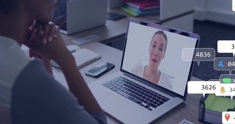 African American Professional Attending Virtual Meeting in Modern Office