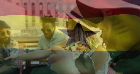 Socializing on Urban Rooftop with Ghana Flag Overlay