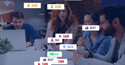 Marketers Analyzing Social Media Metrics in Office Setting