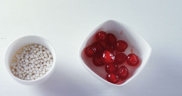 White Tapioca Pearls and Glazed Cherries in Bowls on White Background - Download Free Stock Images Pikwizard.com
