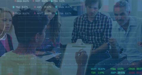 Team analyzing data with digital charts in conference meeting
