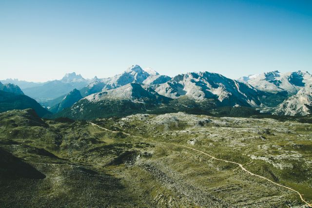 Aerial View of Majestic Mountain Range with Clear Sky - Download Free Stock Photos Pikwizard.com
