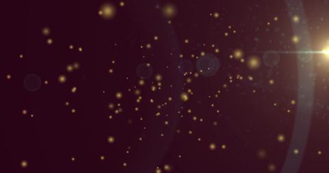 golden particles and bokeh light on brown background - Download Free Stock Images Pikwizard.com
