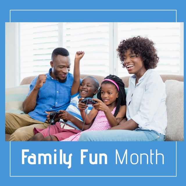 Family fun month text banner against african american family playing video games together at home. family fun month awareness concept