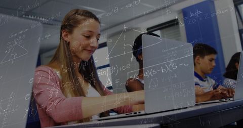 Students Using Laptops with Overlayed Equations in Classroom - Download Free Stock Images Pikwizard.com