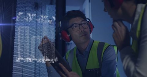 engineers collaborating in advanced server room environment - Download Free Stock Images Pikwizard.com