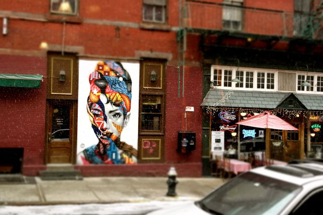 Vibrant Street Art Mural Depicting Woman's Face on Urban Building - Download Free Stock Images Pikwizard.com