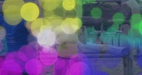 Women Navigating Wooden Obstacle Course with Vibrant Overlay