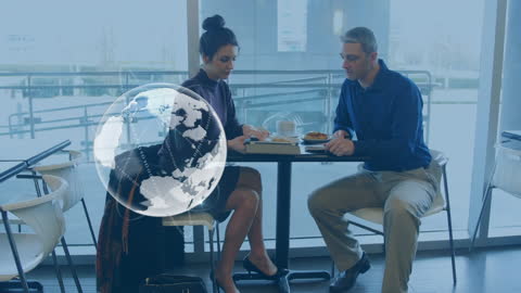 Colleagues Discussing Global Network Strategies in Office Setting