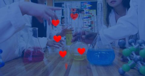 Colorful Chemistry Experiment with Overlayed Heart Icons