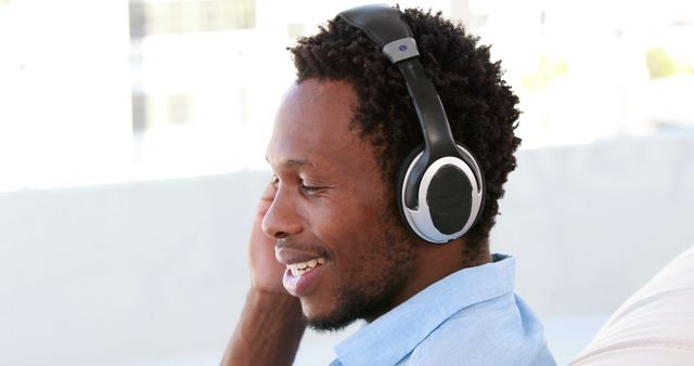 Man Enjoying Music with Headphones Outdoors - Download Free Stock Images Pikwizard.com