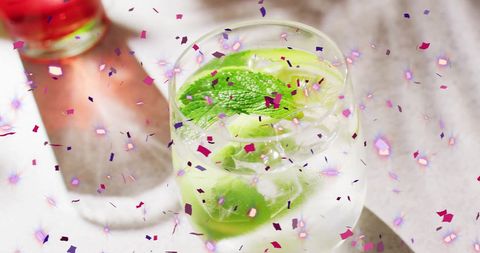 Refreshing Cocktails with Confetti Overlay Celebration