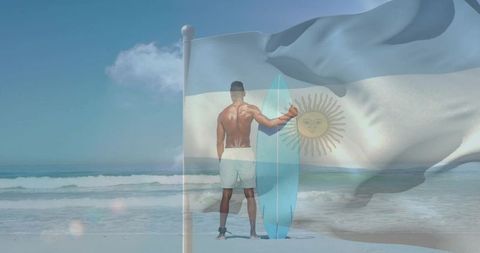Shirtless surfer standing with blue surfboard and argentina flag overlay on beach