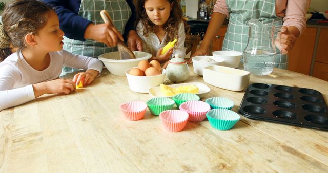 Family Baking Together Making Muffins in Kitchen - Download Free Stock Images Pikwizard.com