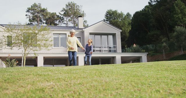 Grandmother and Granddaughter Enjoying Time Together in Front Yard - Download Free Stock Images Pikwizard.com