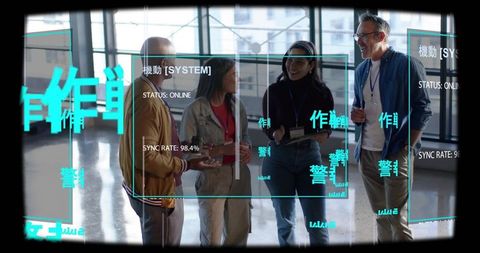 Cross-functional team collaborating with holographic ar interface in bright office atrium