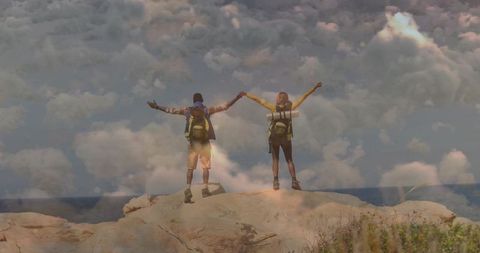 Adventurous Couple Hiking with Ocean View at Coastal Ridge