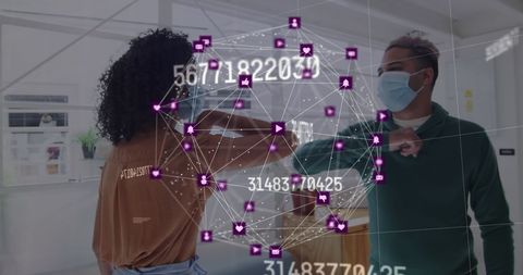 Colleagues Wearing Masks Verifying Digital Connections in Modern Workplace - Download Free Stock Images Pikwizard.com